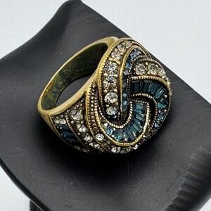 Heidi Daus Cocktail Ring Gold Tone Hand Set Blue Crystal Statement Knot Design